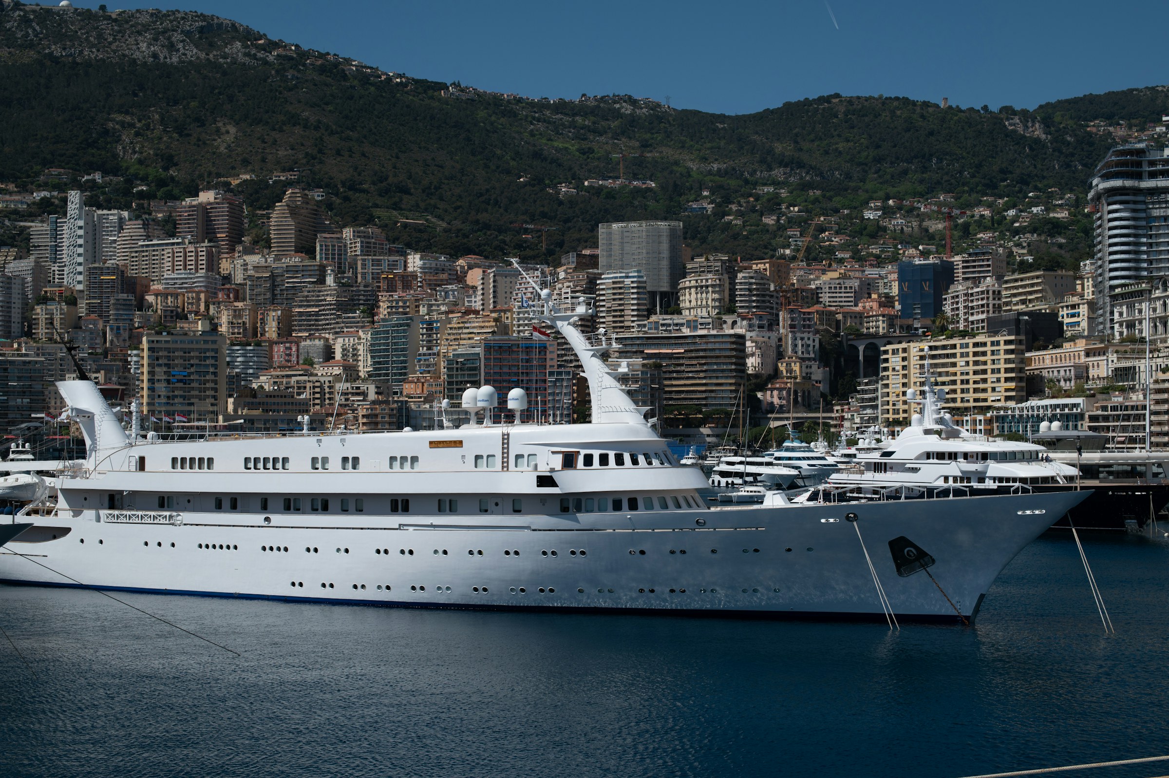 Superyacht moored in a city harbour