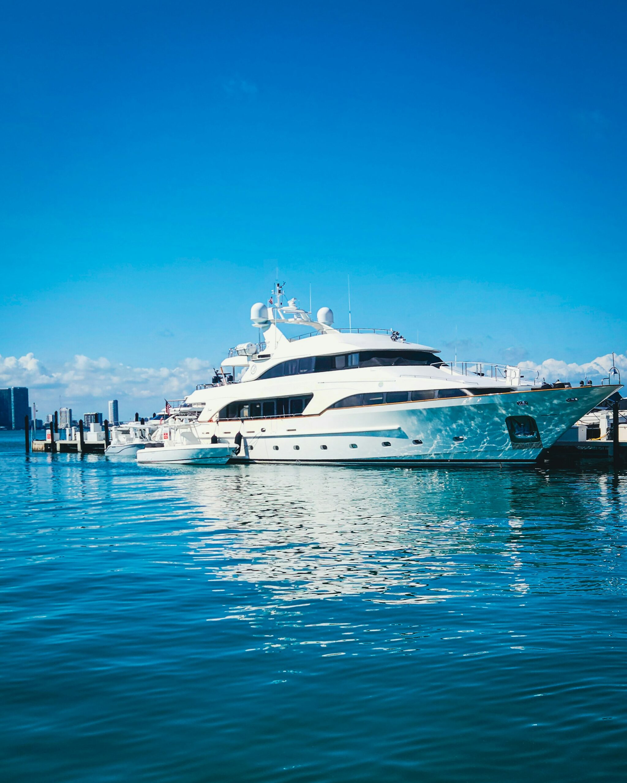 Luxury motor yacht moored at a marina